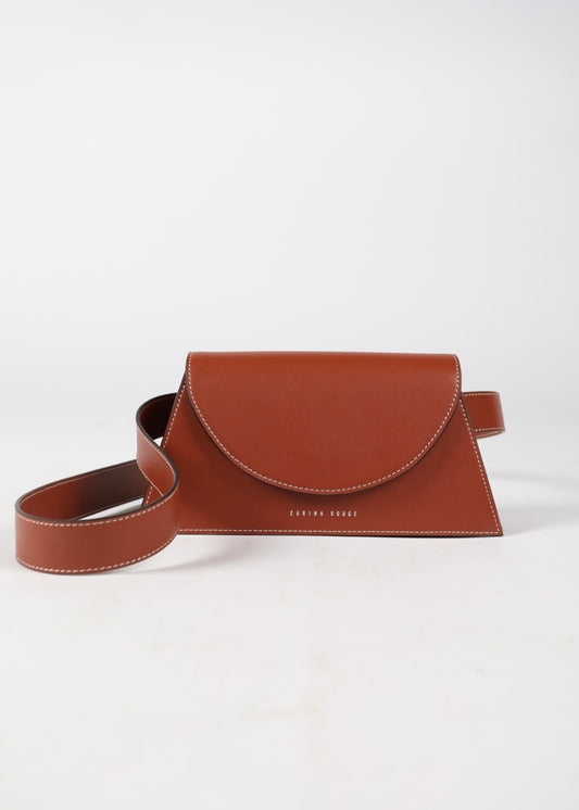 ZARINA ROUGE - This bag is handcrafted by traditional Italian manufacturers using the finest Italian leather. Due to the unique nature of the leather, some colour and texture variation may occur. This is a natural characteristic of the skin which lends to its inherent beauty