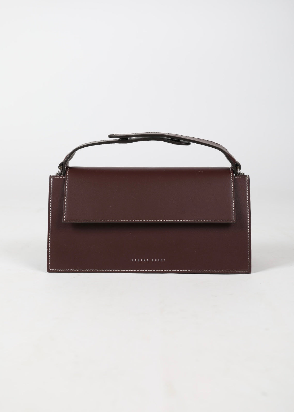 ZARINA ROUGE - This bag is handcrafted by Italian manufacturers using the finest Italian leather. Due to the unique nature of the leather, some colour and texture variation may occur. This is a natural characteristic of the skin which lends to its inherent beauty. Only top quality materials and skins are used for this item.