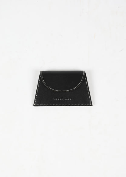 ZARINA ROUGE - This cardholder is handcrafted by traditional Spanish manufacturers using the finest Italian leather. Due to the unique nature of the leather, some colour and texture variation may occur.