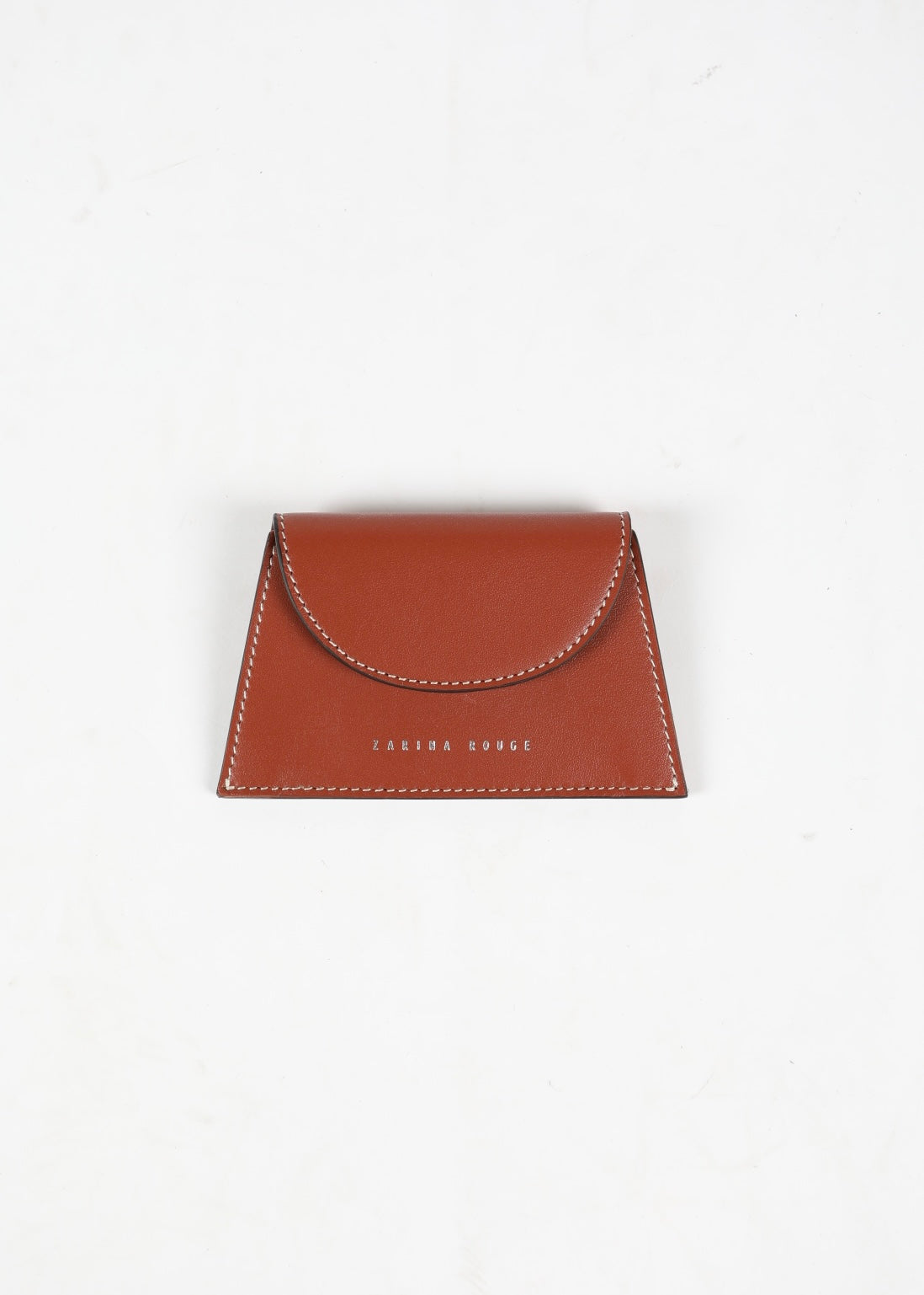 ZARINA ROUGE - This cardholder is handcrafted by traditional Spanish manufacturers using the finest Italian leather. Due to the unique nature of the leather, some colour and texture variation may occur.