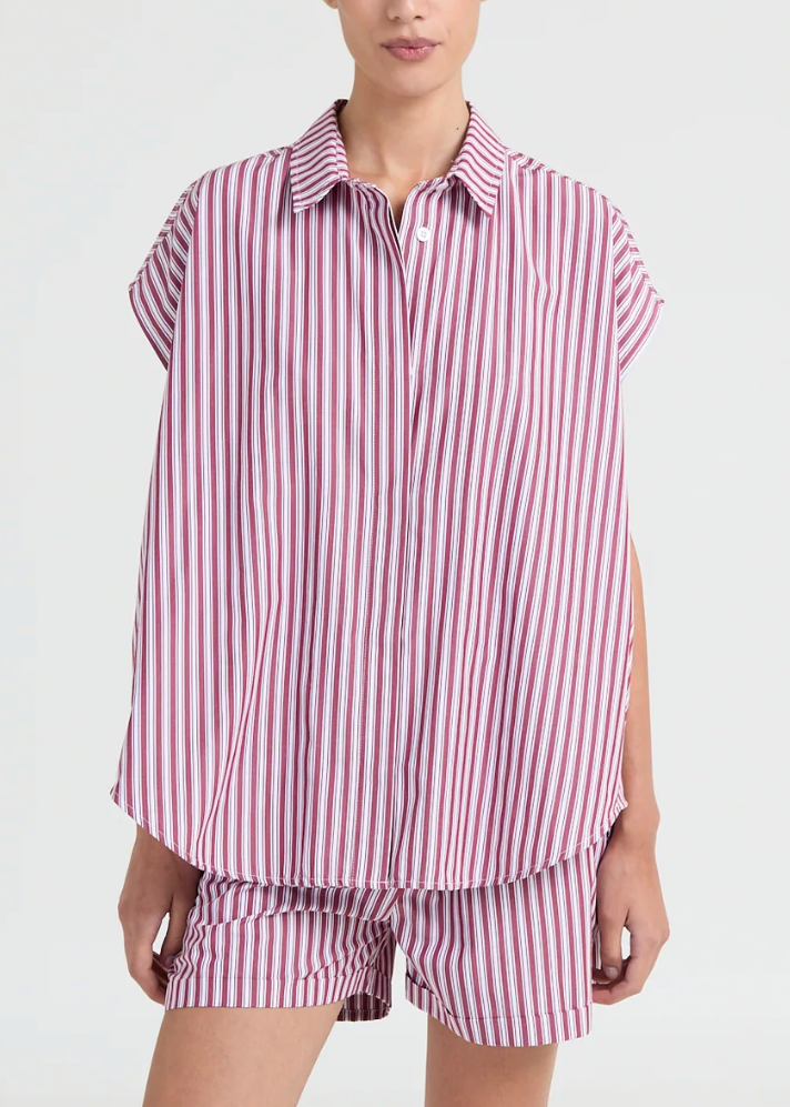Oversized striped blouse with a relaxed fit and cap sleeves.

Color: Pink/Burgundy stripes