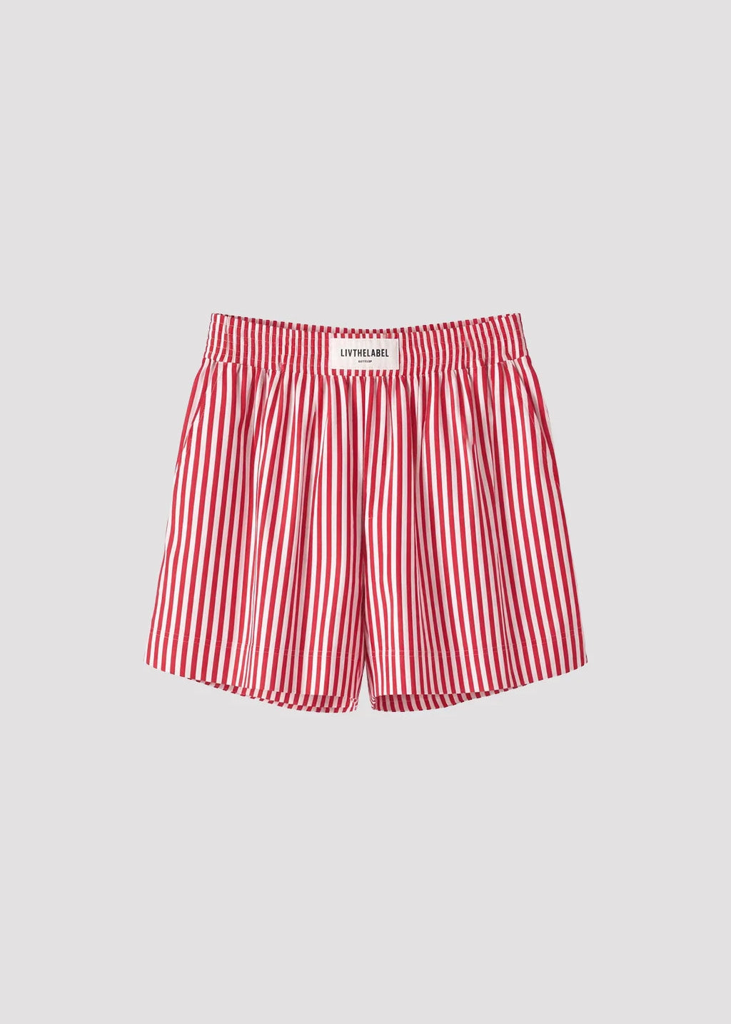 Lightweight shorts crafted from a crisp, smooth cotton with a soft hand feel.
Designed with a relaxed silhouette and elasticated waistband for ease and comfort, defined by clean vertical stripes.

