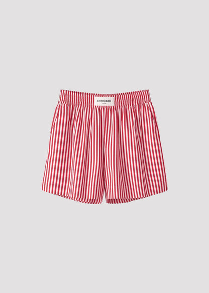 Lightweight shorts crafted from a crisp, smooth cotton with a soft hand feel.
Designed with a relaxed silhouette and elasticated waistband for ease and comfort, defined by clean vertical stripes.

