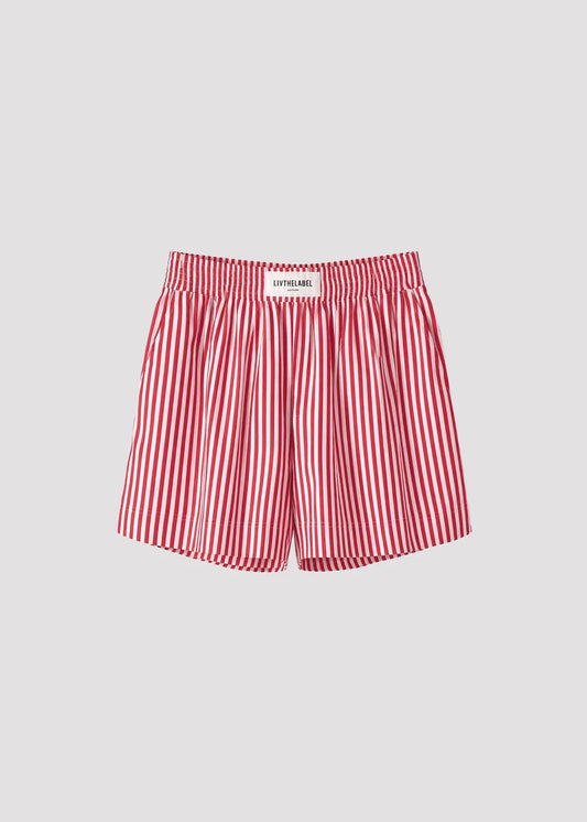 Lightweight shorts crafted from a crisp, smooth cotton with a soft hand feel.
Designed with a relaxed silhouette and elasticated waistband for ease and comfort, defined by clean vertical stripes.

