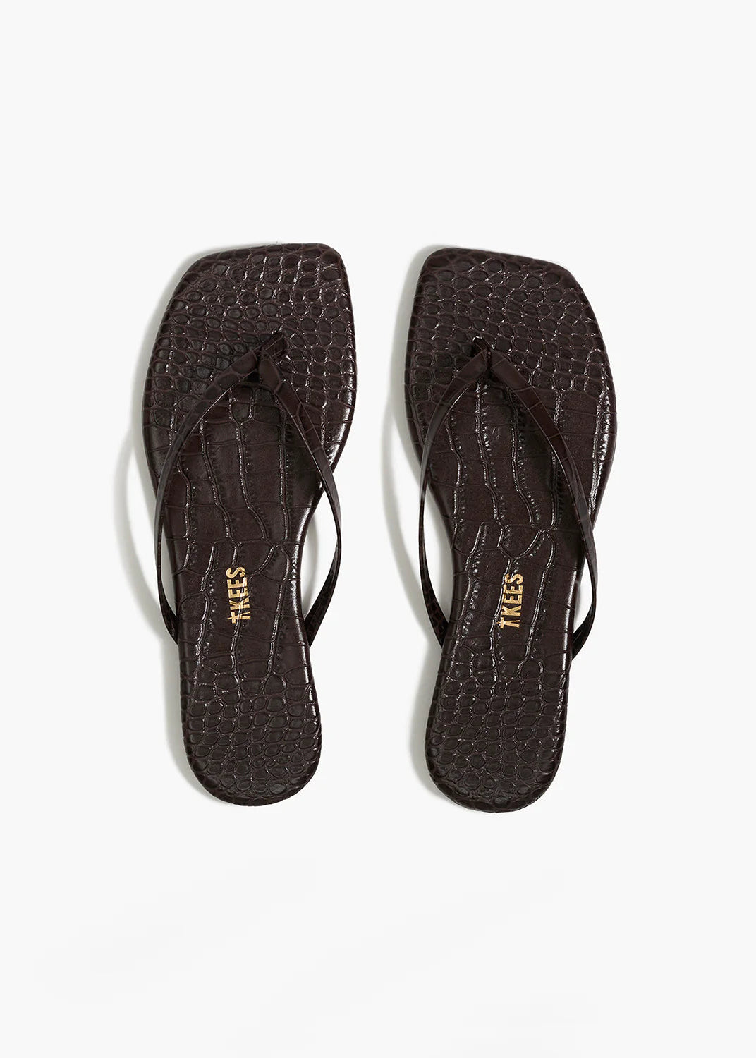 A classic crocodile embossed leather combined with our modern square toe silhouette.