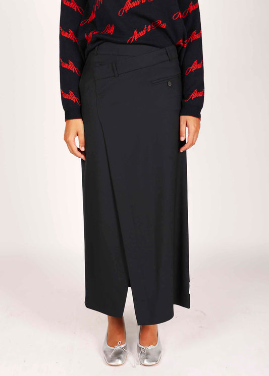 Erika Cavalinni - about a boy skirt in dark blue with slit and a cross-button detail